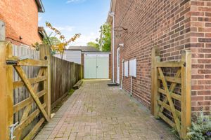 Side Driveway Leading To Garage- click for photo gallery